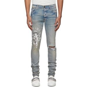 AMIRI
Cherub Skinny-fit Distressed Printed Jeans In Blue Size 36
